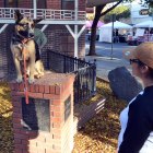 Loki with owner Lorena Perez in Lemoore's Downtown Plaza.